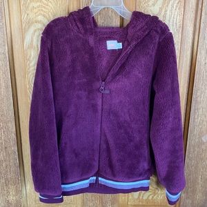 Nwot girls jacket size 7/8. Purple with silver stripe trim. Fuzzy!